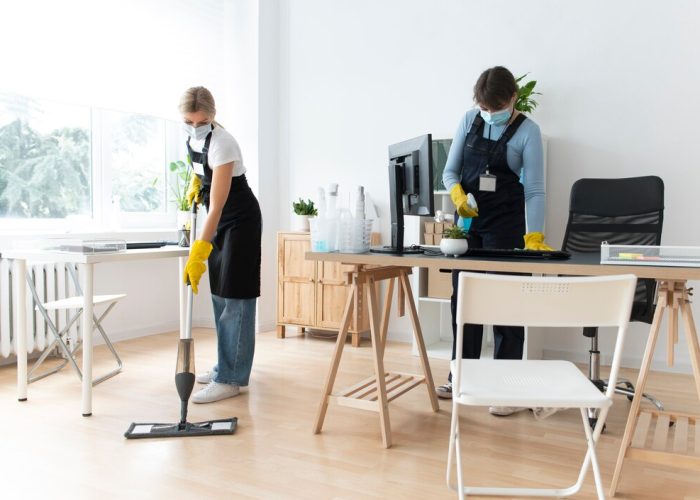 people-taking-care-office-cleaning_23-2149374451